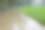 大雨落在公园周围的人行道上图片下载
