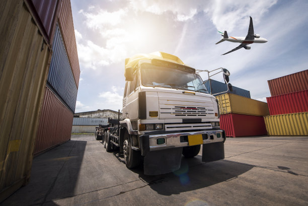 物流进出口背景和运输行业的叉车装卸集装箱集装箱港口图片下载