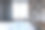 宽敞的家庭办公室中时尚透明工作台的侧面视图，从全景窗口可以看到城市景观，深色墙壁背景上的书架。三维渲染图片下载