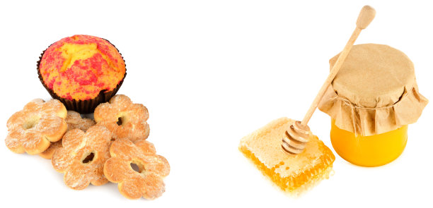 饼干，松饼，蜂巢和蜂蜜罐隔离在白色上。拼贴画。文本的空闲空间。宽的照片。图片下载