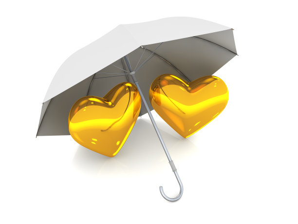 相爱的心撑在一把伞下。恋爱中的情侣概念。情人节背景。图片下载