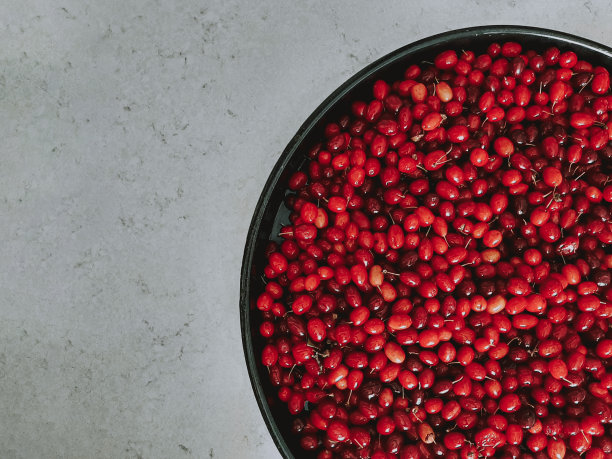 成熟新鲜的蔓越莓为天然食品，浆果为背景图片下载