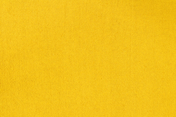 黄色面料为布质背景，天然纺织图案。图片下载