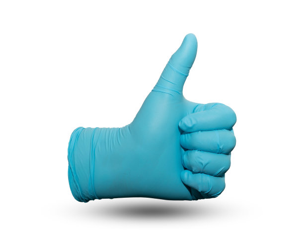 手戴亚硝酸盐手套，拇指朝上，在医学手术中表示良好的迹象，隔离在白色的夹持路径上图片下载