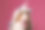 穿着kigurumi睡衣的搞笑创意狗。概念宠物看起来像人类。棕色的澳大利亚牧羊犬穿着白蓝色的独角兽服装，坐在粉红色的背景上微笑。图片下载