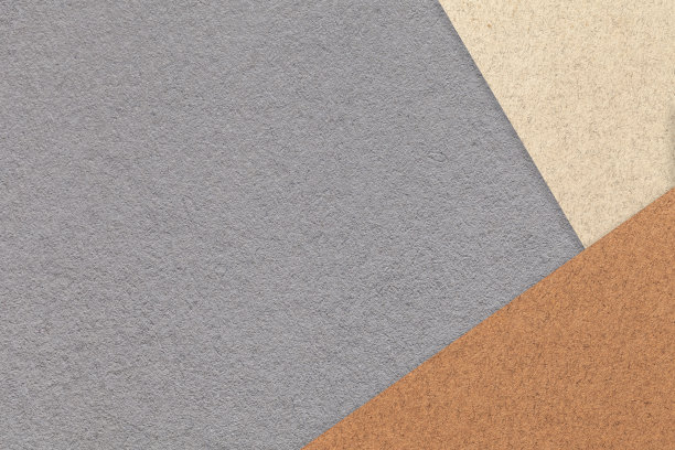 纹理的工艺灰色彩色纸背景与米色和棕色边界。复古抽象灰色纸板。图片下载