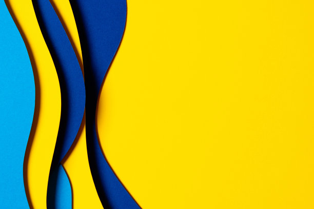 抽象的彩色纸纹理背景。最小的剪纸组成的几何形状和线条层在浅蓝色，海军蓝，黄色的颜色图片下载