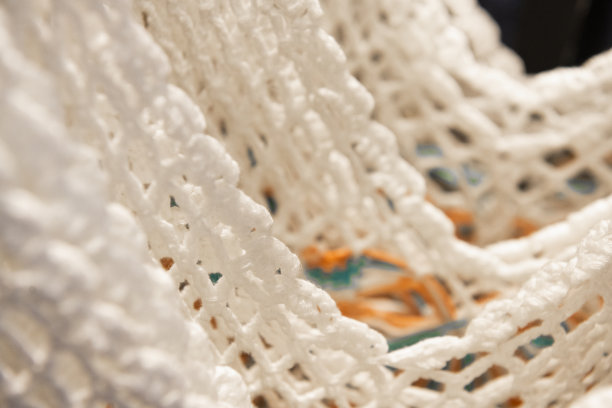 在墨西哥出售的白色针织衬衫的细节特写图片下载