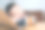 亚洲男孩在笔记本电脑上上网学习时睡觉。图片下载