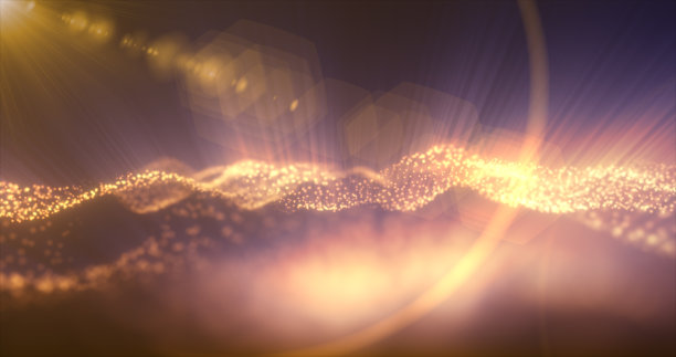 抽象发光的黄色金色魔法能量波从粒子和点明亮闪亮的黑暗背景。抽象的背景图片下载