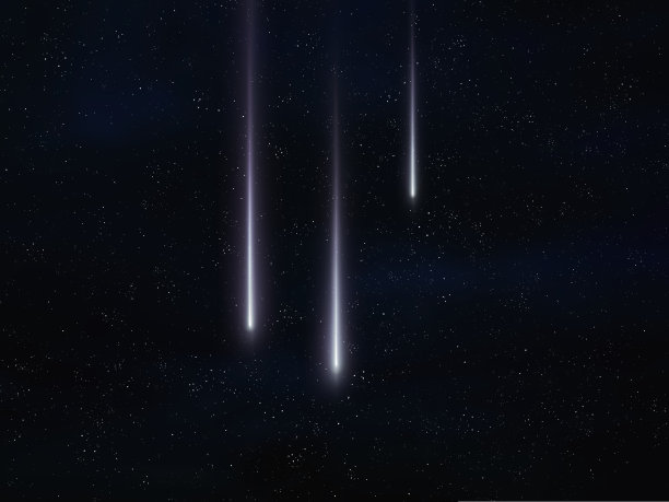 明亮的流星在大气中闪烁。流星。图片下载