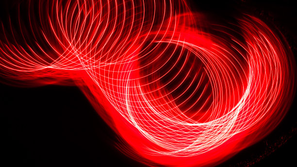 摘要:黑色背景上迷人的色彩漩涡图片下载