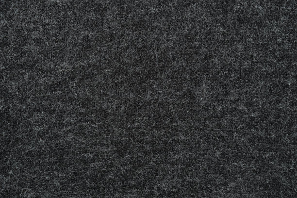灰色毛织针织物纹理。摘要现代针织纹理深灰色颜色。针织背景手工作品图片下载