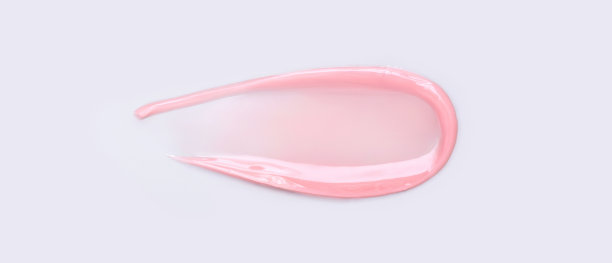 在浅灰色背景上涂抹香脂面膜凝胶图片下载