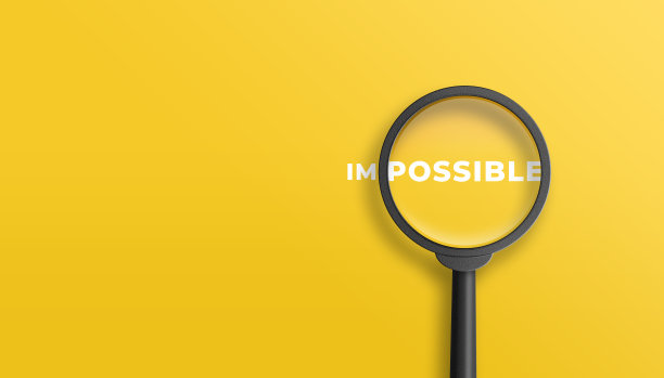 放大镜聚焦在“不可能”这个词可能的一面。可能的动机灵感概念。3 d演示。图片下载