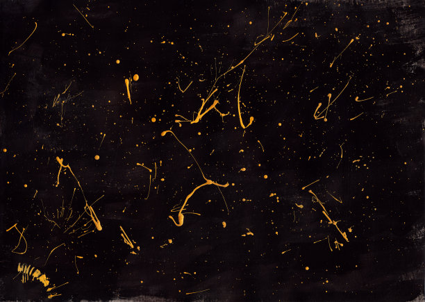 金色的精细飞溅和污渍在黑色饱和水彩背景图片下载