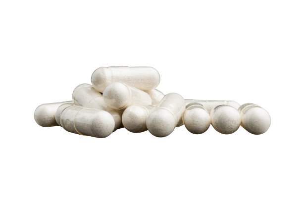 白色背景上隔离的白色治疗胶囊或药丸，医学和保健概念，特写视图图片下载