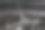 一个汽车修理工正在修理车门。一个汽车修理工从车门上钻出一个汽车铆钉。用钻头和钻头工作。图片下载