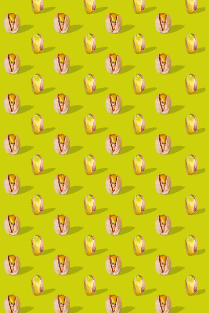 开心果作为图案。现代食品概念。有开心果的海报。图片下载