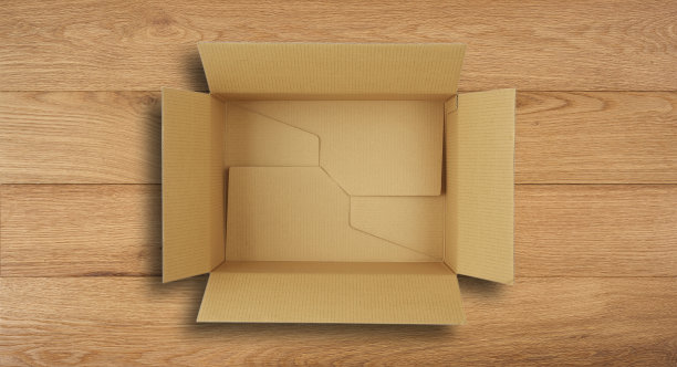 封闭射击纸盒胶带和隔离在一个木制背景。图片下载