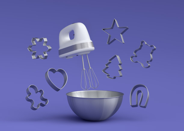 金属碗，电动搅拌机和饼干切割机在紫色的背景图片下载