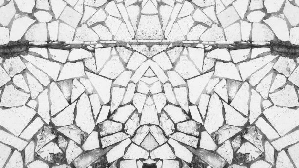 复古铺装瓷砖表面。风化的古代地板。古董灰泥墙。陷入困境的纹理。对称的旗帜。黑白两色图片下载