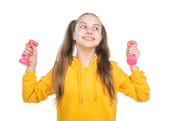 快乐坚强的少女训练与杠铃隔离上白，健身图片下载