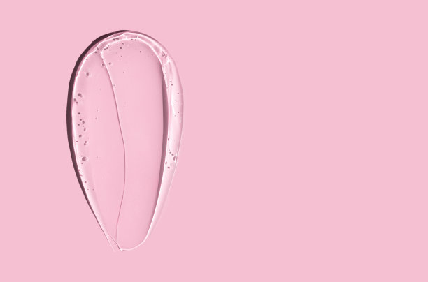 纹理凝胶血清在粉红色背景图片下载