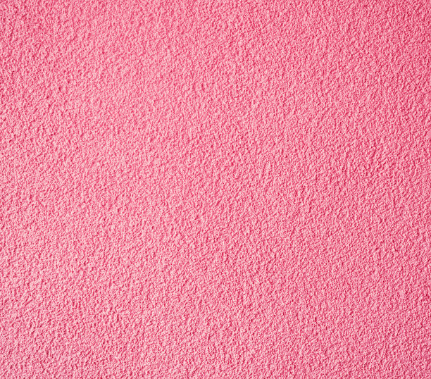 粉红色的装饰抹灰墙。图片下载