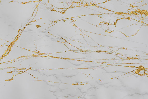 白色和金色大理石豪华的墙壁纹理与闪耀的金色线条图案抽象的背景设计为封面书或壁纸和横幅网站图片下载