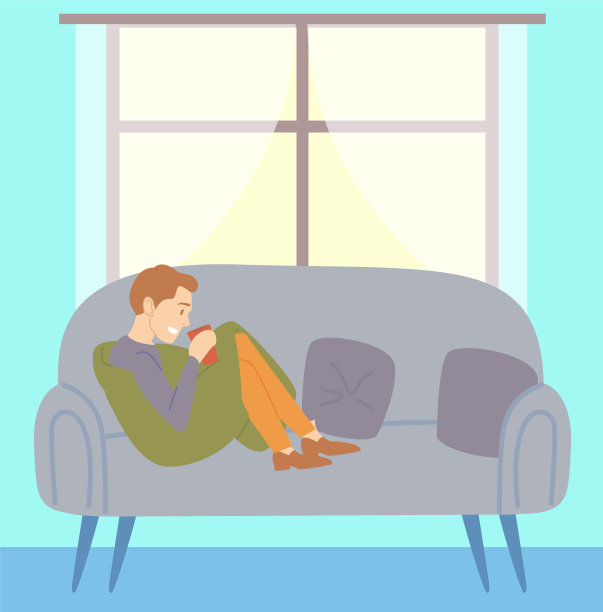 男人坐在沙发上喝咖啡或茶在公寓里。一个人独自呆在家里图片下载