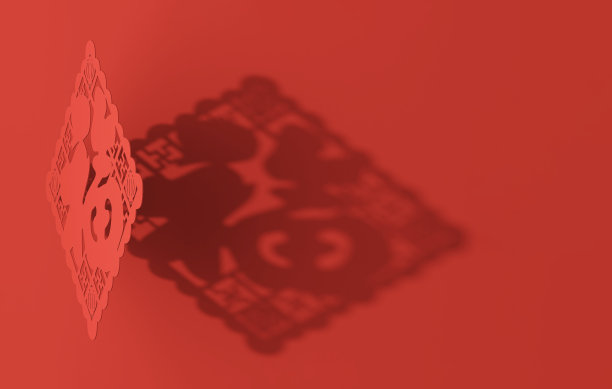 顶部视图的中国新年剪纸装饰与字福，这意味着幸福在充满活力的哑光红色背景投射阴影图片下载