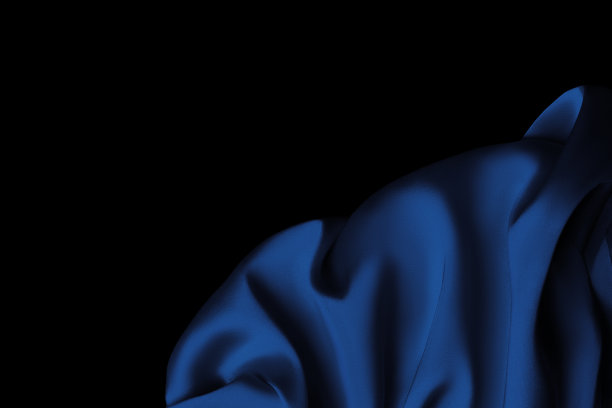 蓝色缎面织物以镂空褶皱的形式铺在表面，丝绸背景，缎面背景图片下载