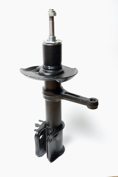 汽车备件。汽车前减震器。白色背景上对比鲜明的照片。前支柱液压减震器图片下载