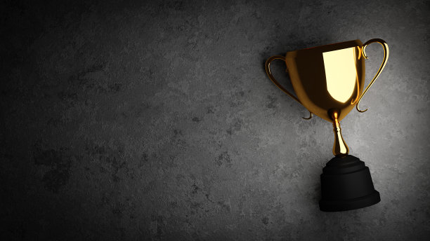 混凝土背景上的金奖杯。三维插图渲染。图片下载