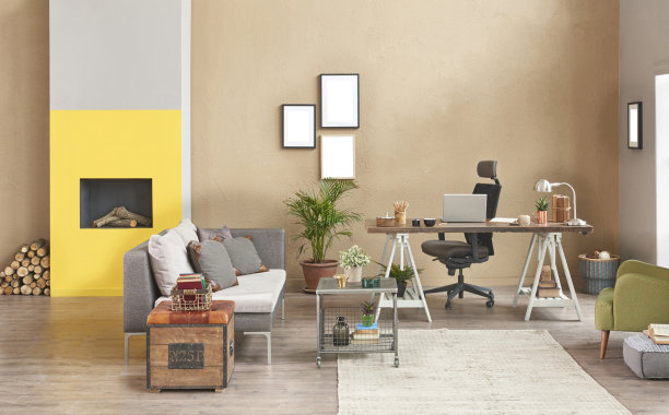 现代家居室内在男人家办公室和书房书桌笔记本电脑壁炉架植物花。图片下载