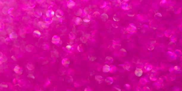 抽象的粉色洋红色背景与未聚焦的散景。图片下载