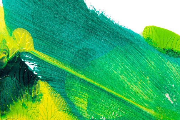 采用罗夏墨渍法在白纸背景上画出绿色黄色抽象丙烯色彩纹理图片下载