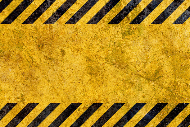 垃圾黄色和黑色斜条纹。工业警示背景，警示警示，施工，安全图片下载