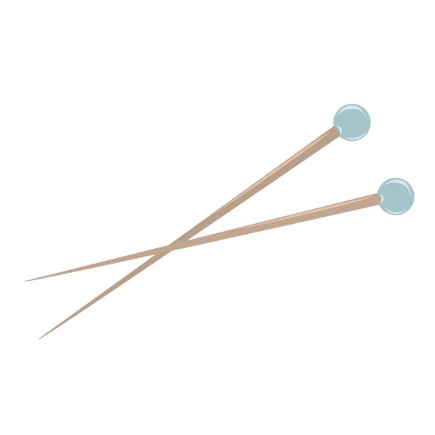 白色背景上的针织针。图片下载