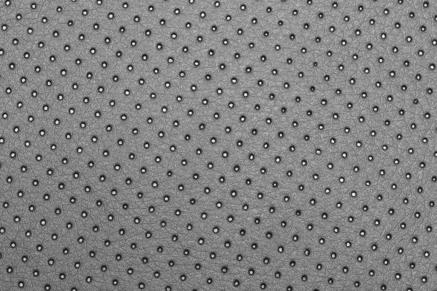 无缝穿孔黑色皮革几何图案的背景，旗帜，或封面图片下载