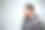 工作室肖像-墨西哥巴哈帽衫套头毛衣-软灰色背景-积极的情绪-侧面图片下载