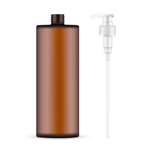 琥珀色瓶子与泵螺旋盖，隔离在白色背景图片下载