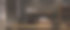 拷贝空间在木制办公桌与笔记本电脑，咖啡杯和装饰在现代家庭办公室在晚上图片下载