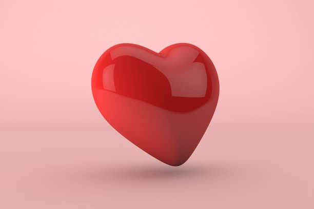 粉色背景上的3d心脏图片下载