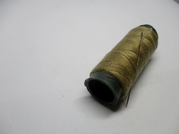 照片的线轴缝纫线缝制衣服图片下载