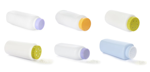 白色背景翻转婴儿爽身粉瓶，横幅设计图片下载