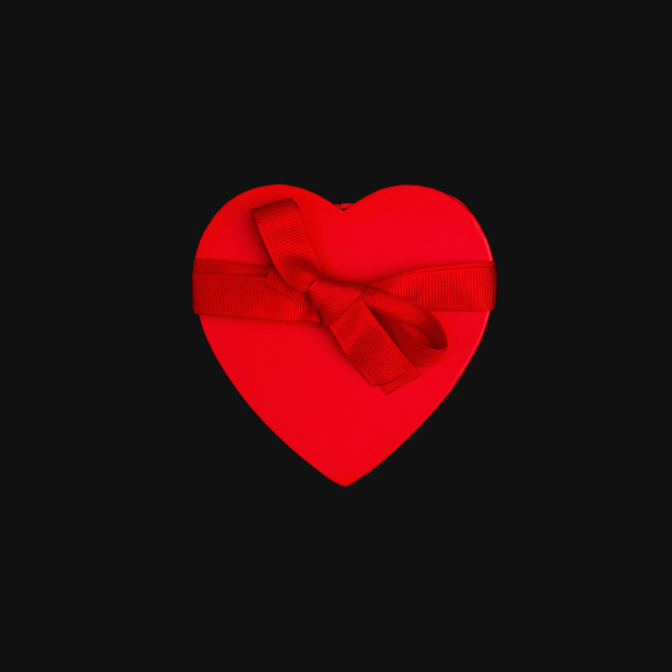 黑色背景的红色心形情人节礼盒图片下载