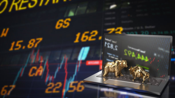 黄金牛和熊笔记本上的业务概念3d渲染图片下载