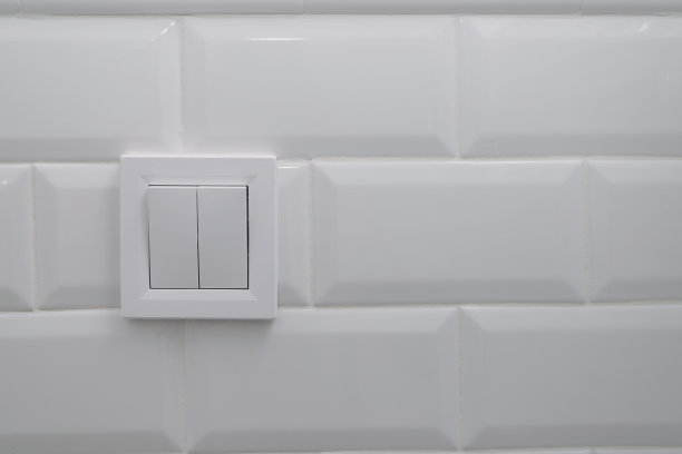 现代双开关光滑的瓷墙图片下载